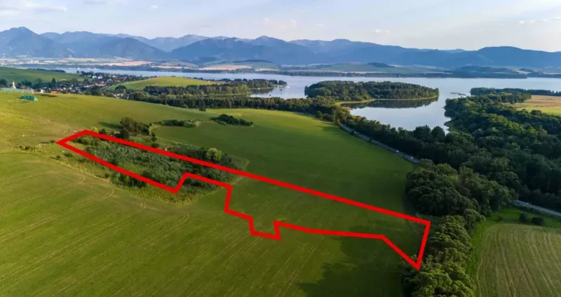 Aerial view of the Special Properties in Liptovský Trnovec with surroundings and water surface.