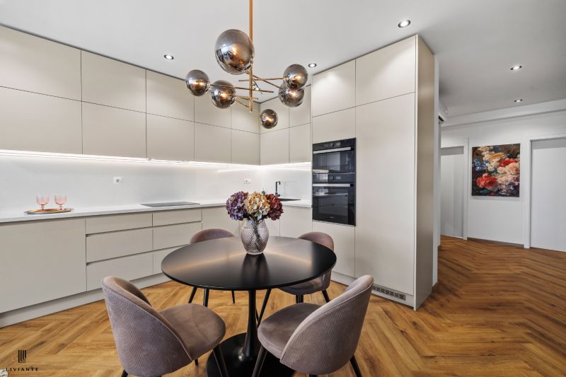 The 3-room apartment includes a kitchen with furniture and a floor with a wooden decor.