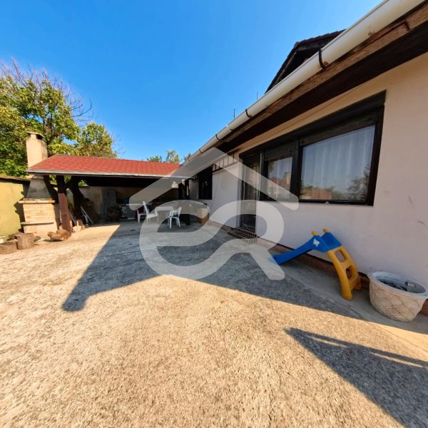 A family house on Prenosilova Street in Mojmírovce with a terrace and garden furniture.