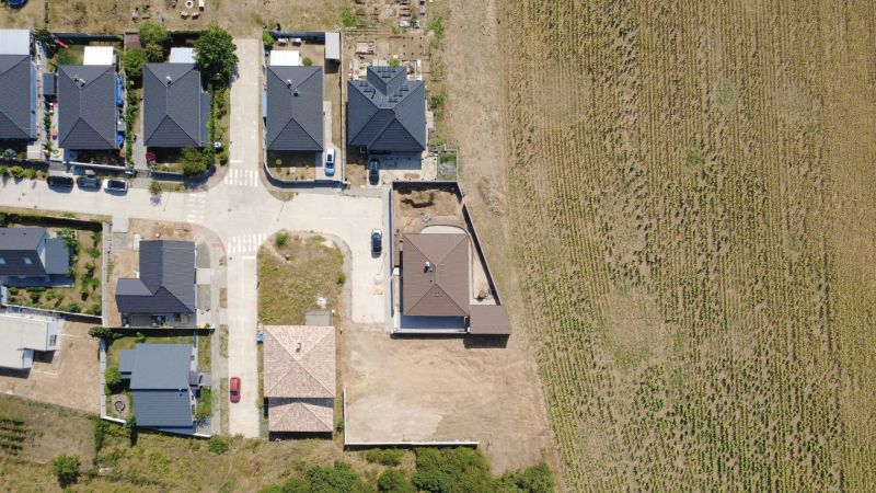 Aerial view of family houses in Suchá nad Parnou in Vlčia Dolina, plots - housing.