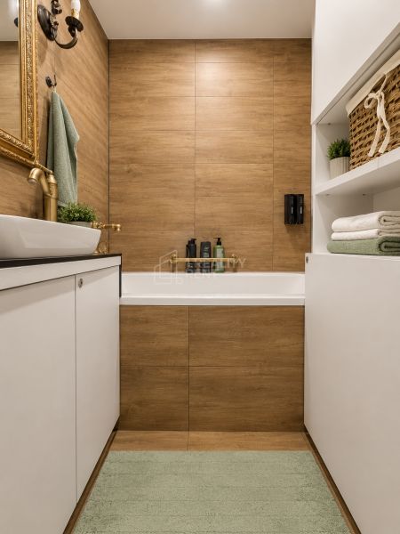 A bathroom with wood-patterned tiles, white cabinets, and accessories in a 3-room apartment.