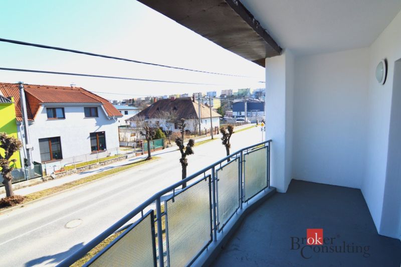 The balcony of a 2-room apartment on Letecká Street in Spišská Nová Ves with a view of the houses.