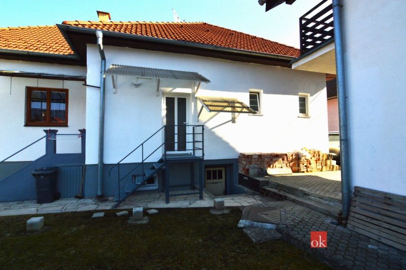 The courtyard of a family house on Letecká Street in Spišská Nová Ves with a concrete staircase.