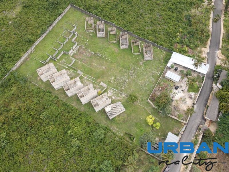 Aerial view of unused commercial land with buildings in Matemwe, Unguja North East.