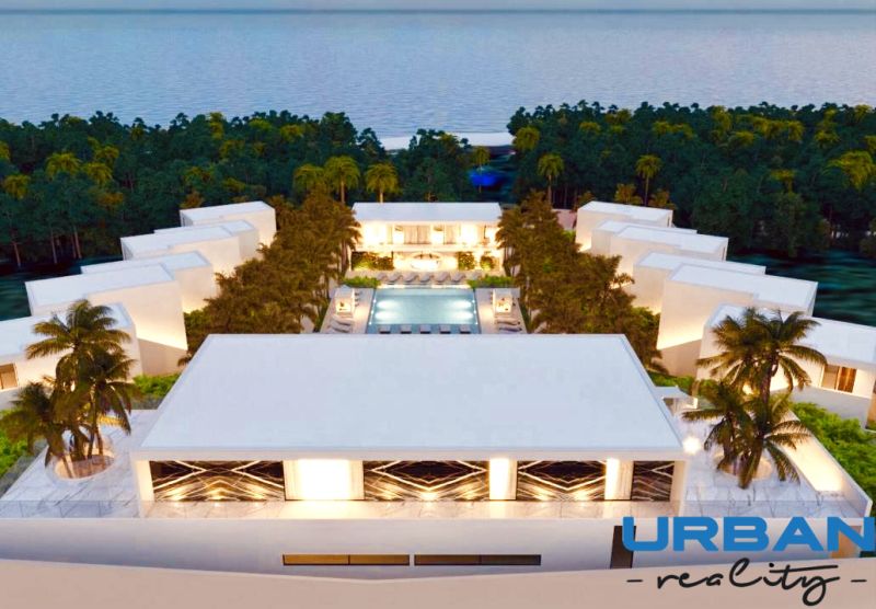 Luxury resort buildings with a pool and palm trees in Matemwe, Unguja North East, commercial land.