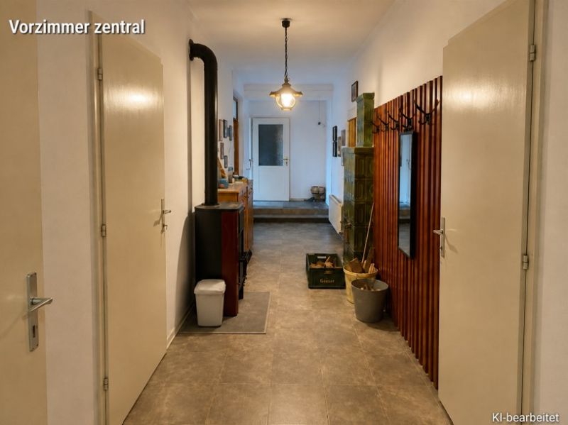 A hallway in a family house with a coat rack, mirror, and stove, and a floor with a wooden decor.