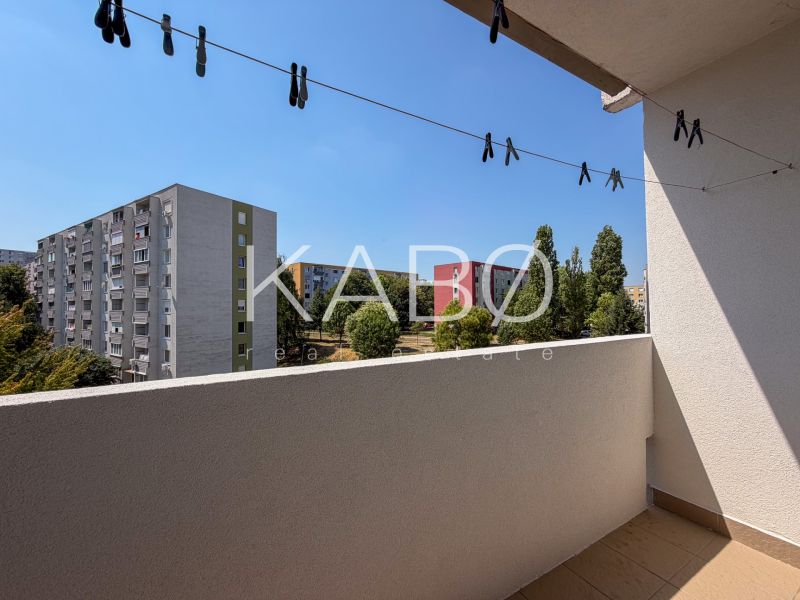The balcony of a 2-room apartment on Škultétyho Street in Nitra with a view of the panel buildings.