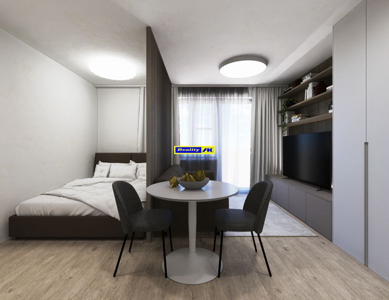 Interior of a 3-room apartment with a bed, dining table, and television.