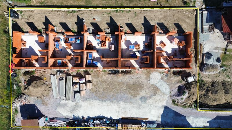 Construction of a family house in Nová Polhora on Nová Polhora Street from an aerial view.
