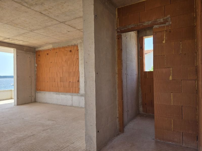 Rough construction of a 4-room apartment with a sea view in SRIMA.
