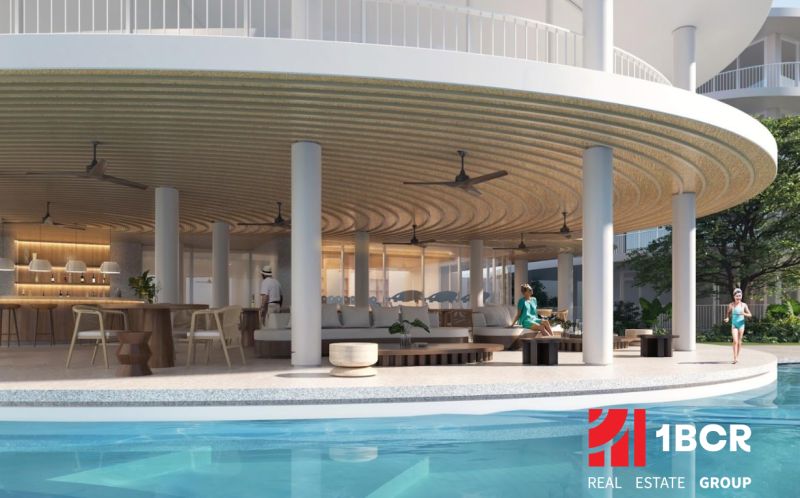 Poolside seating with a bar under construction in an apartment complex in Surat Thani.