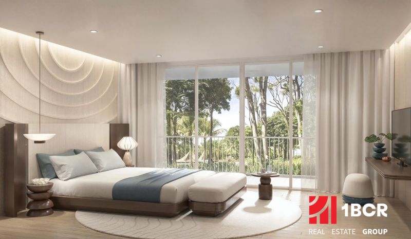 Bright bedroom in a 2-room apartment with large windows and a wooden decor floor.
