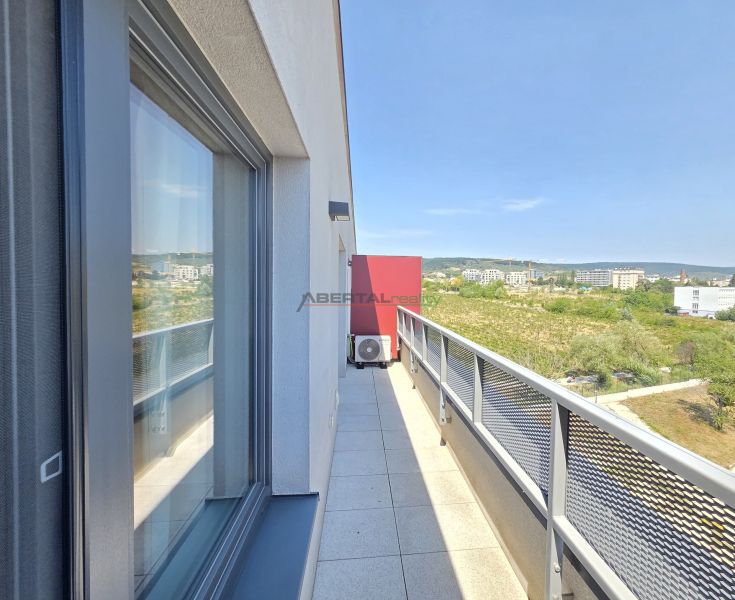 Balcony from a 2-room apartment on Malokrasňanská Street in Bratislava - Rača with a view.