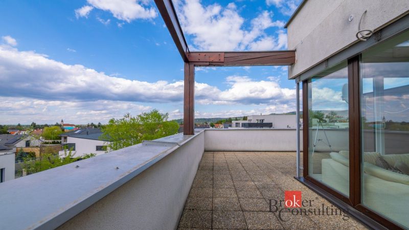 The terrace of a family house in Bratislava-Záhorská Bystrica, Kapsohradská, with a panoramic view of the surroundings.