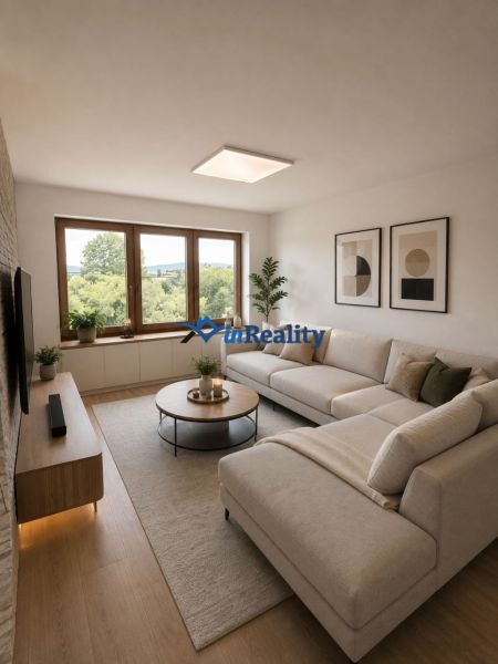 Living room in a family house with a sofa, a table, and a wooden decor floor.