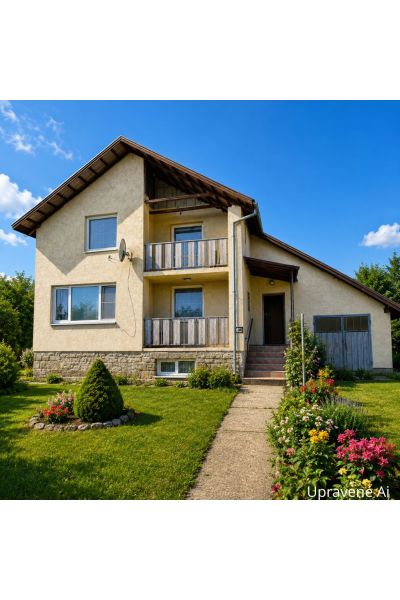 A family house on Biela Street in Kazimír, surrounded by a garden and flowers.