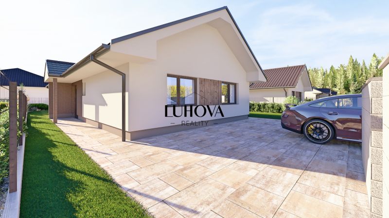 A family house in Tuchyňa on Tuchyňa Street with a terrace and parking on a paved area.