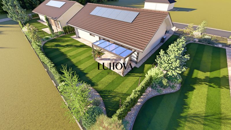 A family house in Tuchyňa on Tuchyňa Street with a landscaped garden and a sunny terrace.