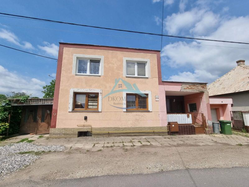 A family house on Šípošova Street in Šahy with a two-story facade and a garage.