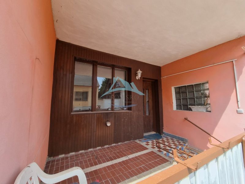 Entrance to the family house on Šípošova Street in Šahy with ceramic tiles.