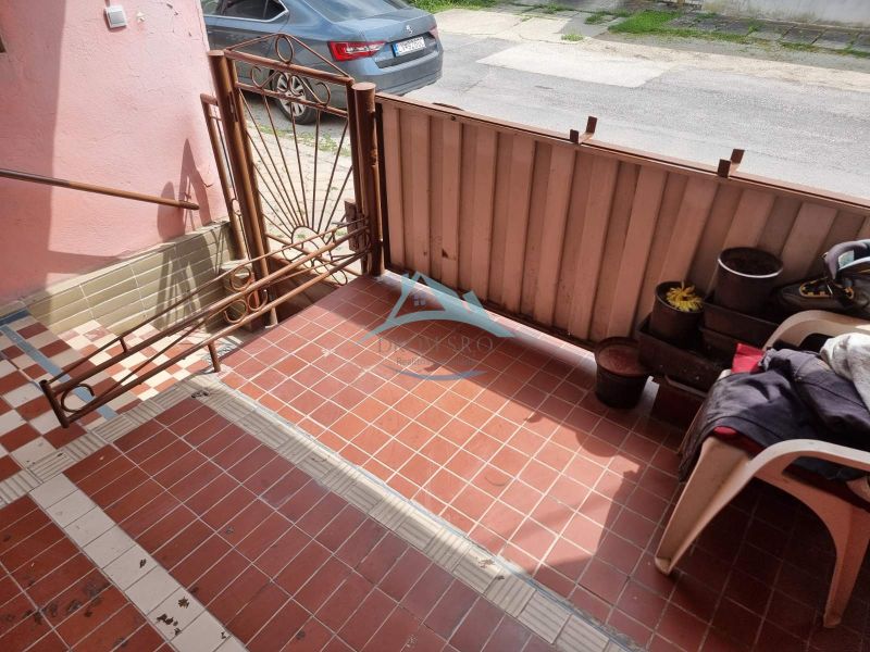 In front of the family house on Šípošova Street in Šahy, there is a terrace with paving.