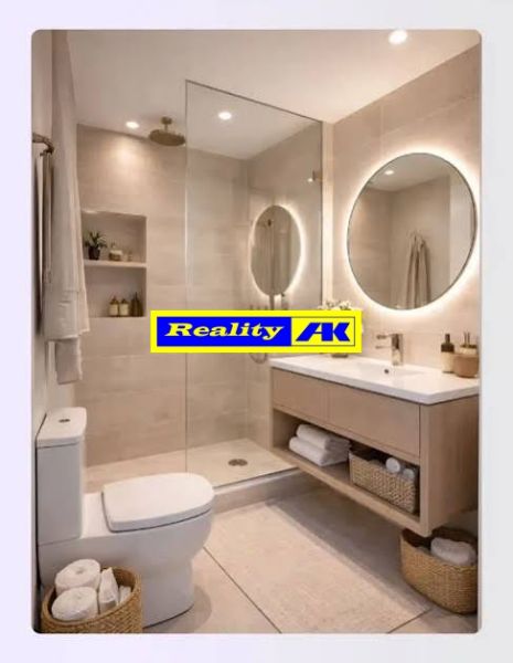 A stylish bathroom with an oval mirror and open shelves in a 4-room apartment.