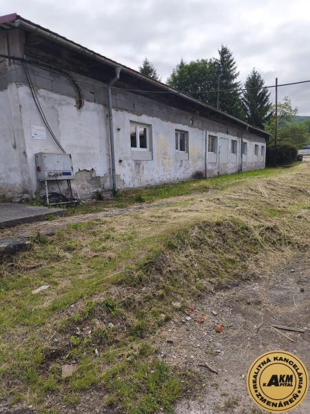 The exterior of an older building, warehouses and halls in Žiar nad Hronom, with neglected surroundings.