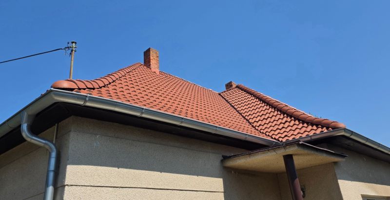 A family house on Murgašova Street in Šaľa with a tile roof and a chimney.
