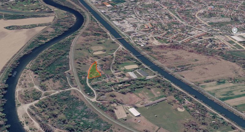 Aerial view of the Vážske arm near Piešťany, recreational plots marked in red.