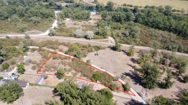 Aerial view of recreational plots in Piešťany surrounded by greenery and roads.