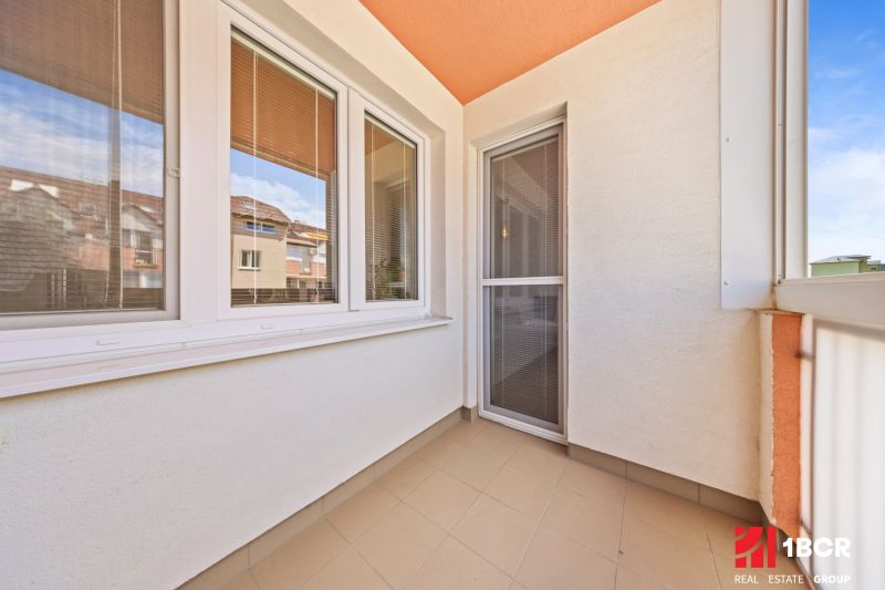 A balcony in a 2-room apartment with a view of Dona Sandtner Street, Pezinok.