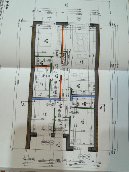 Building plan of a family house with rooms and dimensions on the drawings.