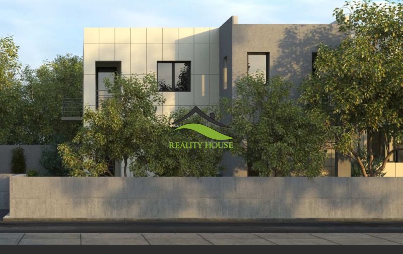 A modern building in Michalovce surrounded by greenery, suitable for a 3-room apartment.