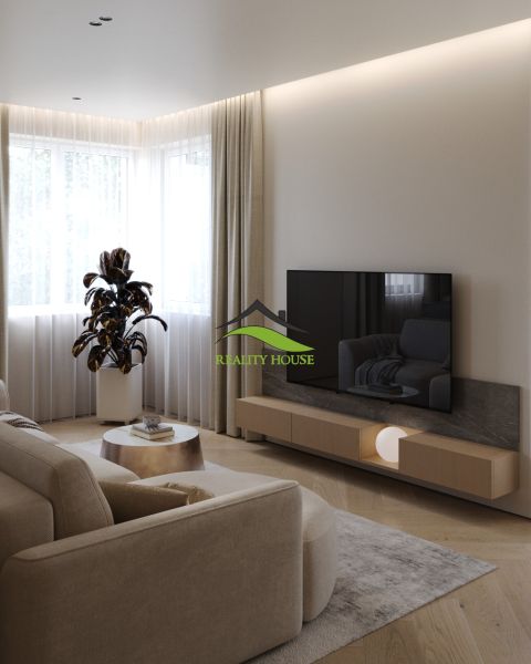 Living room in a 3-room apartment with a comfortable sofa and a floor with a wooden decor.