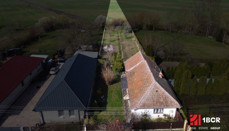 A family house in Mani on Legionárska Street with a garden and surrounding nature.