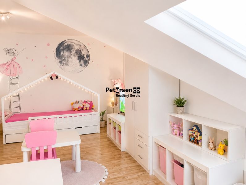 A children's room with moon decor and wooden decor flooring in a 3-room apartment.