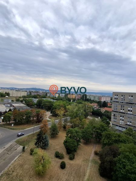 View of greenery and apartment buildings from Stavbárska in Bratislava - Vrakuňa.