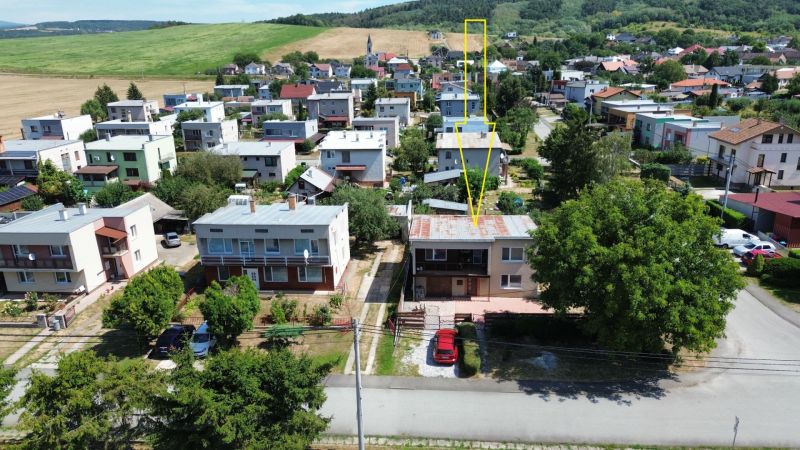 Aerial view of a residential area in Kráľovce with a family house on Kráľovce Street.