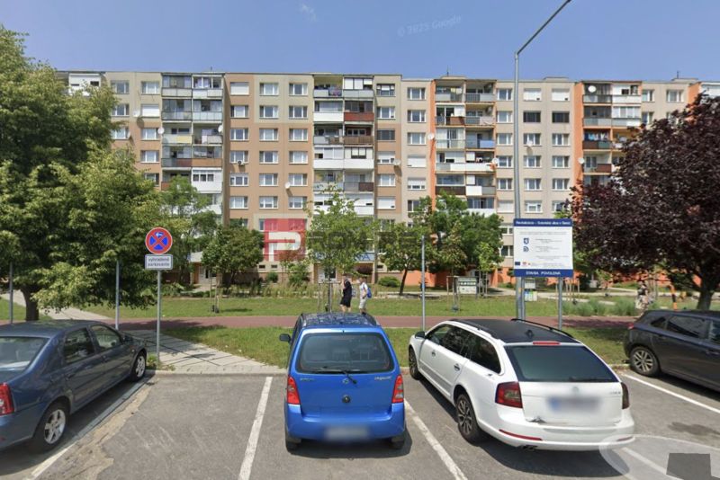 Parking lot in front of the apartment building on Sokolská Street in Senec.