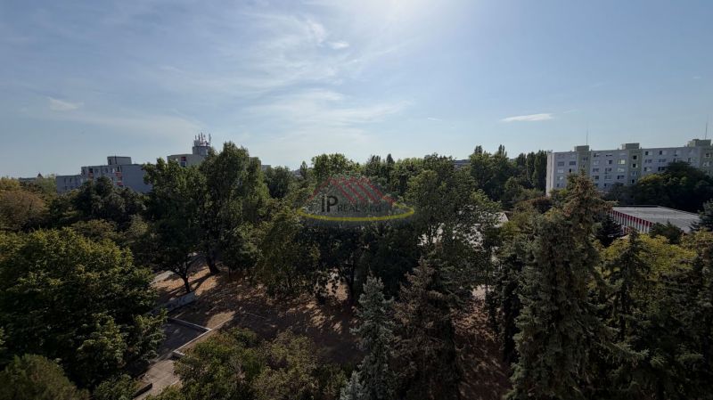 View of greenery and panel buildings from a 3-room apartment on Šándorova Street, Bratislava - Ružinov.