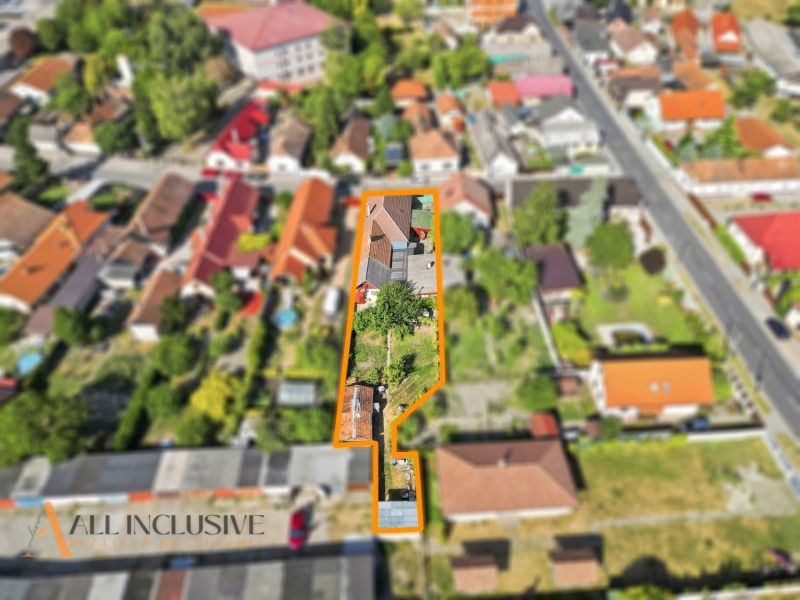Aerial view of a family house in Veľký Meder with a yard and garden.