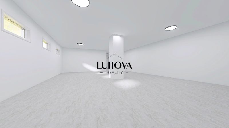 Spacious commercial spaces with wood decor flooring, suitable for various uses.