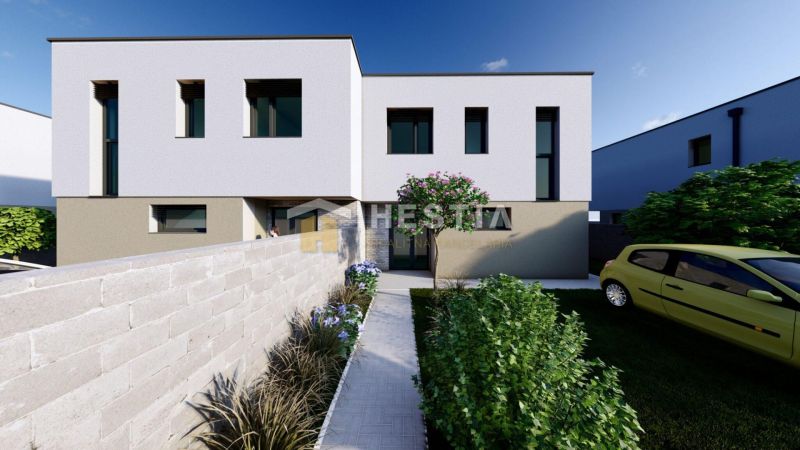 A family house in Rovensko with a courtyard, a walkway, and a parked car.