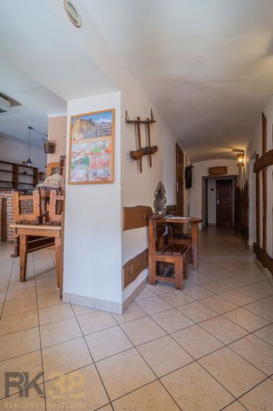 Interior gastro spaces with furniture and wall decorations.