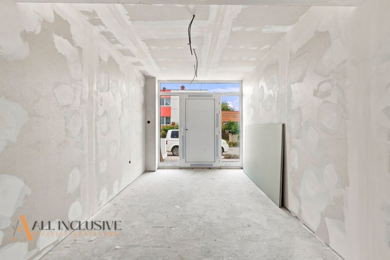 Preparations for interior renovation in a family house, view of the hallway with doors.