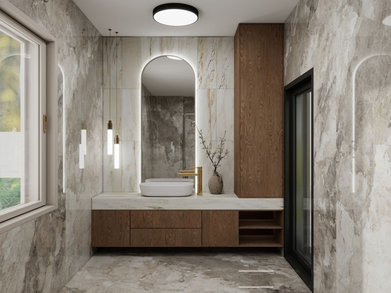 A bathroom in a family house with marble tiles and wooden elements.