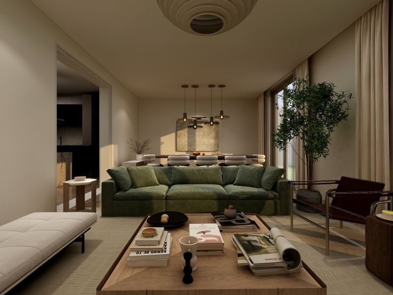 Living room in a family house with a comfortable green sofa, a coffee table, and candlesticks.