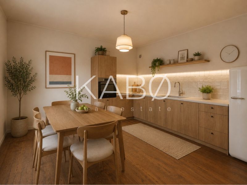 A kitchen with a table and chairs, a floor with a wooden decor, light wood, plants.