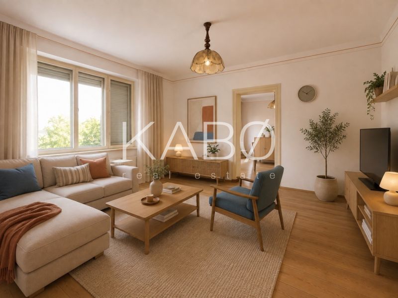 Living room in a family house with a wooden decor floor and comfortable furniture.