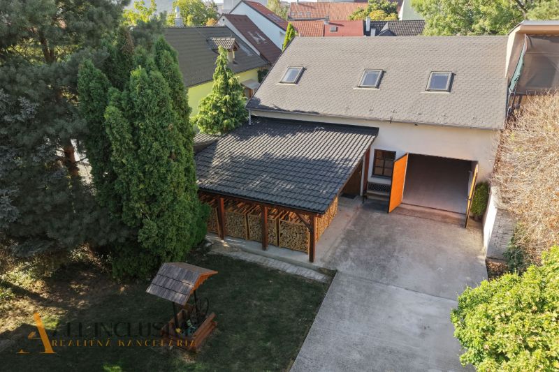 A courtyard in Pezinok with a garden shelter and a garage, Residential plots.